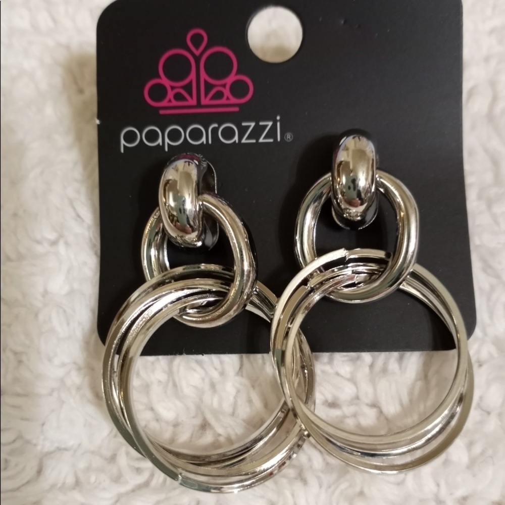 Dynamically Linked - Silver earring. NWT
